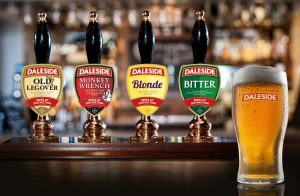 Real,Wood,Table,With,Light,Reflection,On,Scene,At,Restaurant,